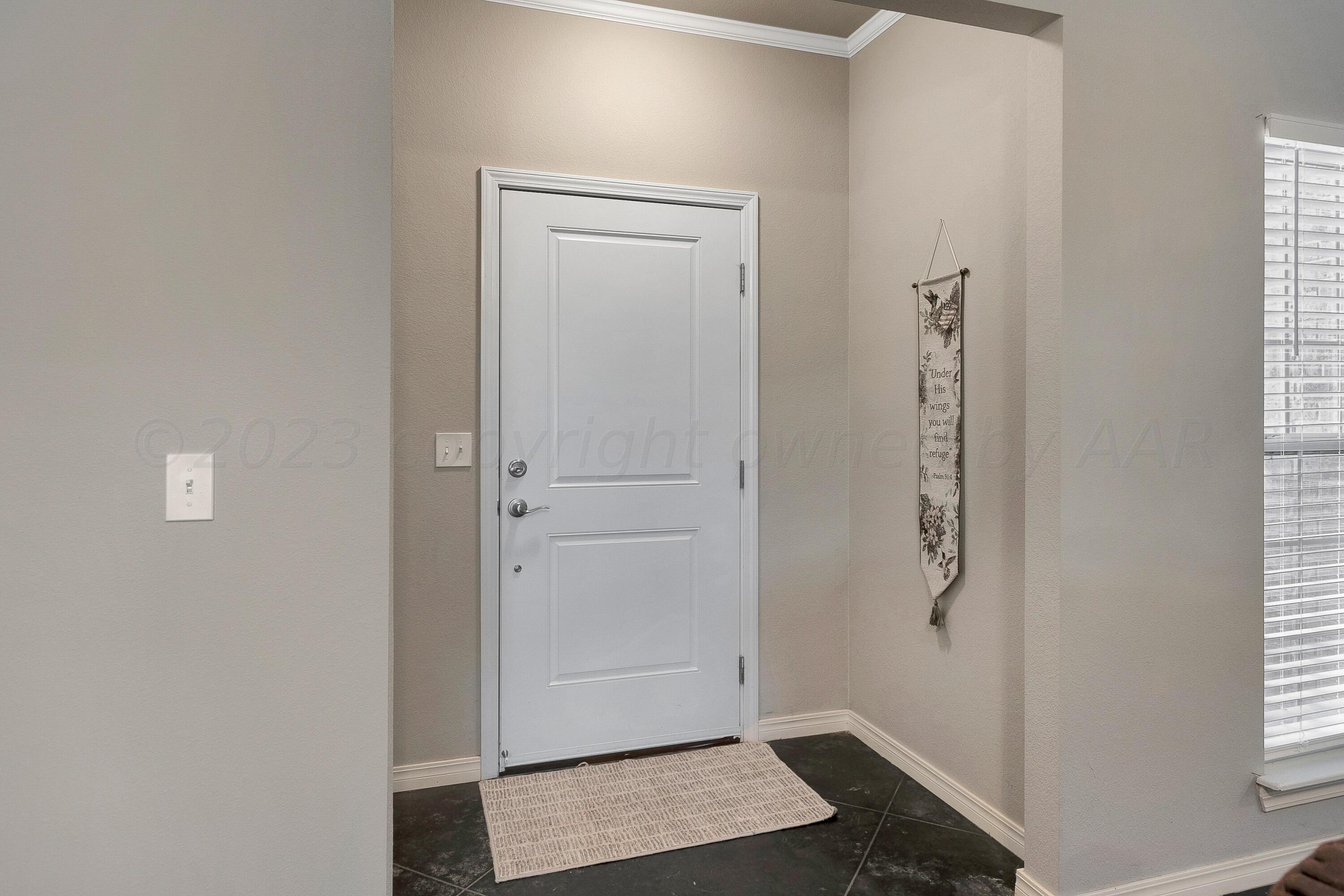 9927 Perry Avenue Amarillo, TX 79119 - Photo 4 of 24 a view of an empty room