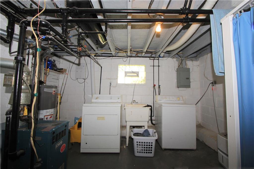 1360 Center Street McKees Rocks, PA 15136 - Photo 14 of 19 The laundry area is neat and clean with plenty of space for the washer and dryer with a stationary tub in-between.