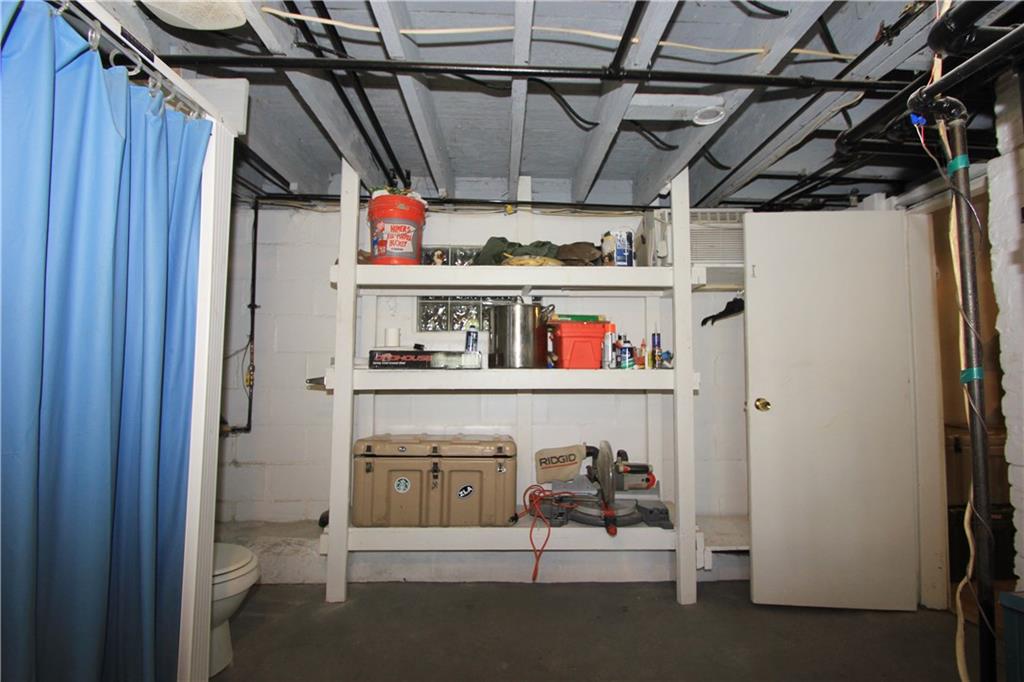 1360 Center Street McKees Rocks, PA 15136 - Photo 16 of 19 This picture shows the storage shelves just inside the entry door from the family room.