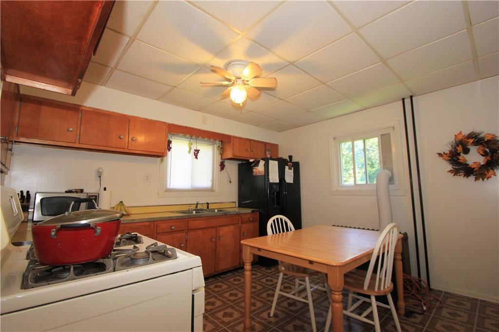 1360 Center Street McKees Rocks, PA 15136 - Photo 6 of 19 There is a portable air conditioning unit shown that may be included in the sale for the right offer! There is plenty of space for a large table and chairs.