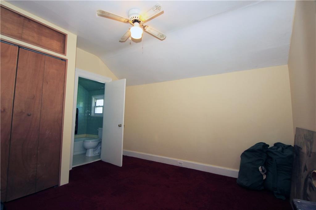 1360 Center Street McKees Rocks, PA 15136 - Photo 8 of 19 This alternate view of the master bedroom shows the full bath off the room and the large closet.