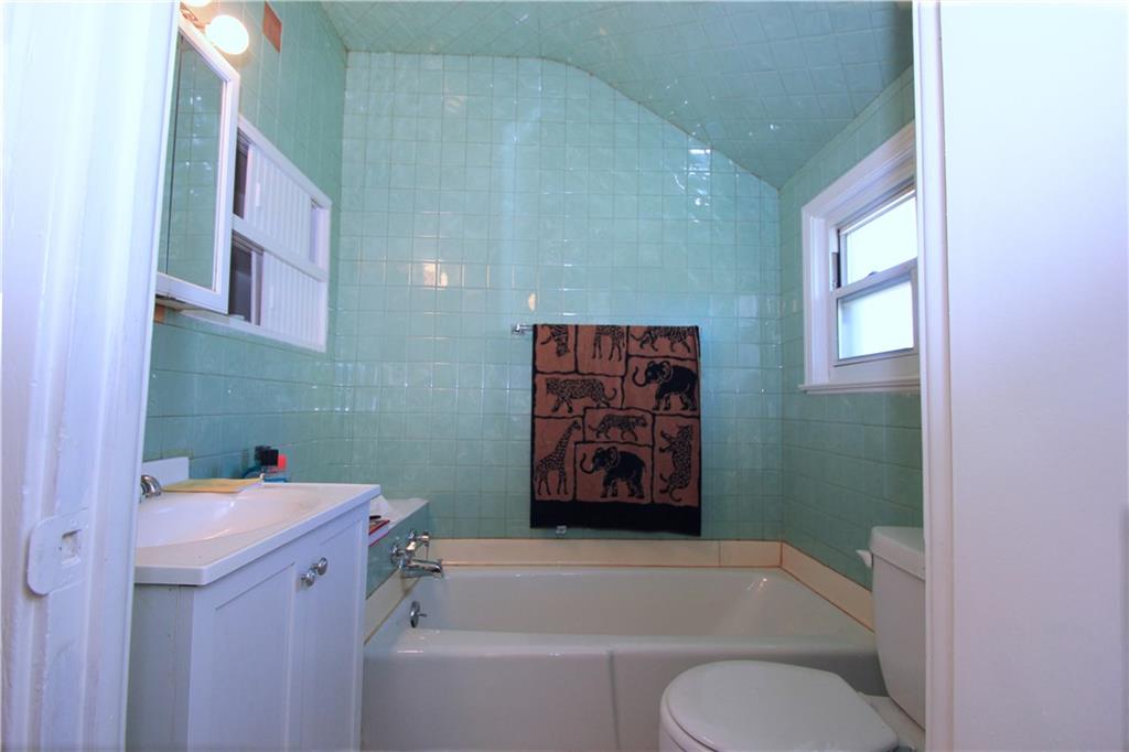 1360 Center Street McKees Rocks, PA 15136 - Photo 9 of 19 This is the full bath on the second floor with a large vanity and lighted mirror medicine chest and a soaking tub.