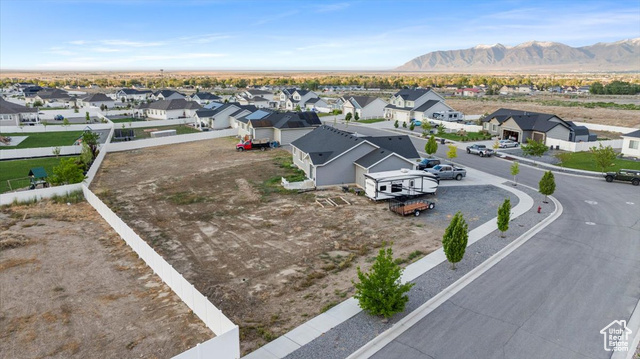 464 South Trejo Rdg Road Grantsville, UT 84029 - Photo 31 of 33 Aerial view of residential area with a mountainous background