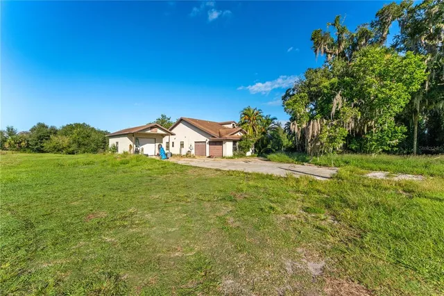 a house view with a garden space