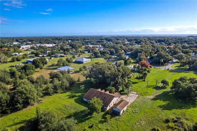 an aerial view of a city with lots of residential buildings