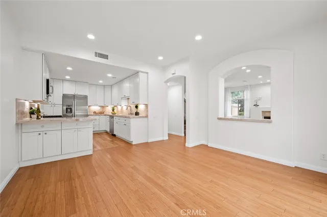 a view of kitchen with wooden floor