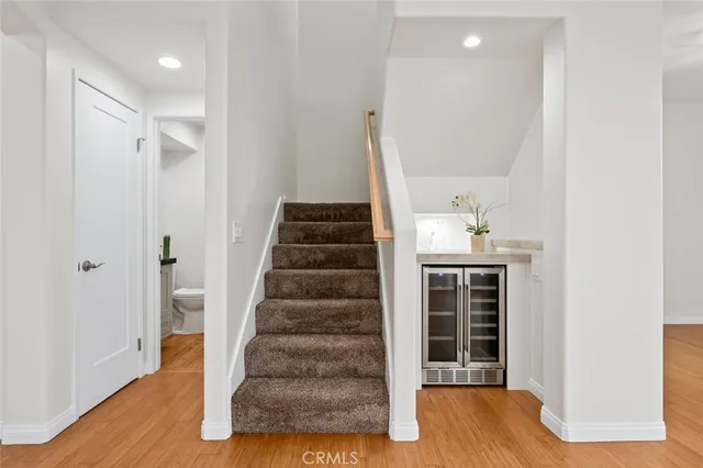 a view of a hallway with staircase