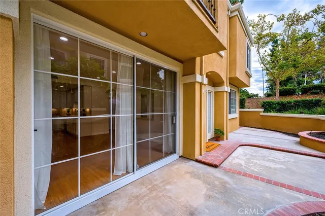 a swimming pool with outdoor seating and yard