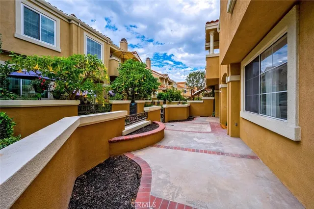 a view of a swimming pool with a lounge chairs