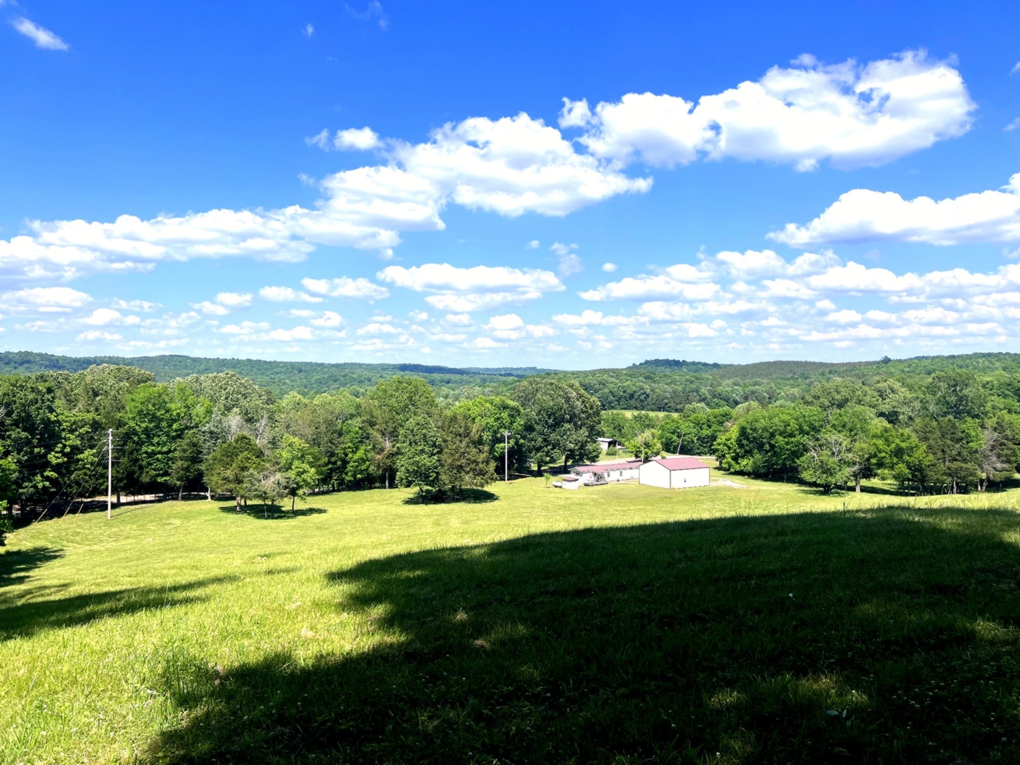 1133 Culps Bend Road Clifton, TN 38425 - Photo 47 of 51 a view of a golf course with a lake
