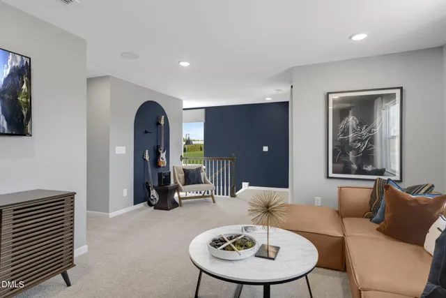 a room with lots of potted plants