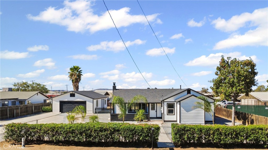 1116 7th Street Calimesa, CA 92320 - Photo 1 of 52 a front view of multiple houses with yard