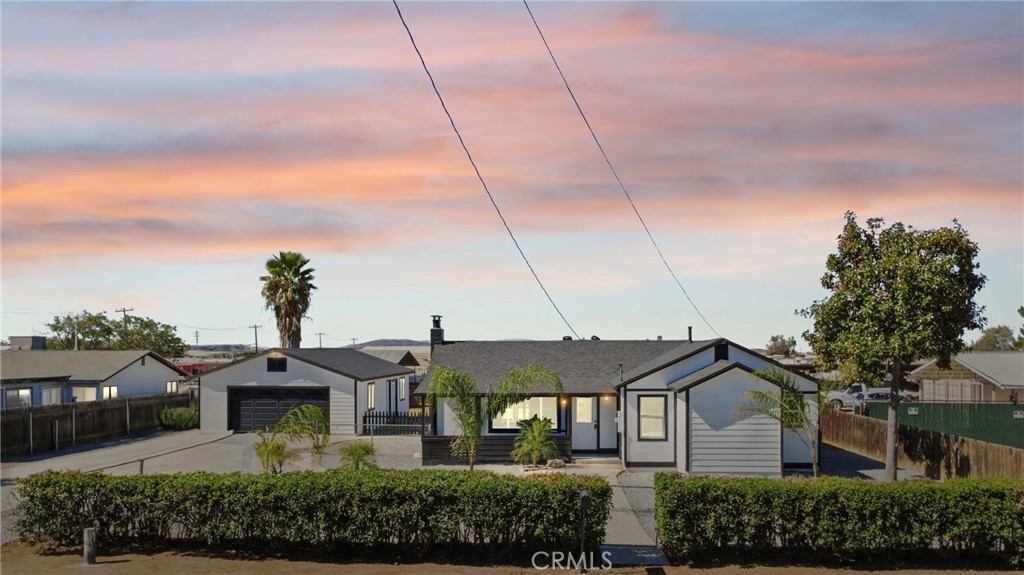 1116 7th Street Calimesa, CA 92320 - Photo 2 of 52 a front view of a house with a yard