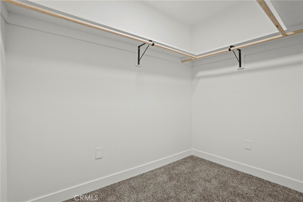 1116 7th Street Calimesa, CA 92320 - Photo 24 of 52 a view of small space with racks on the wall