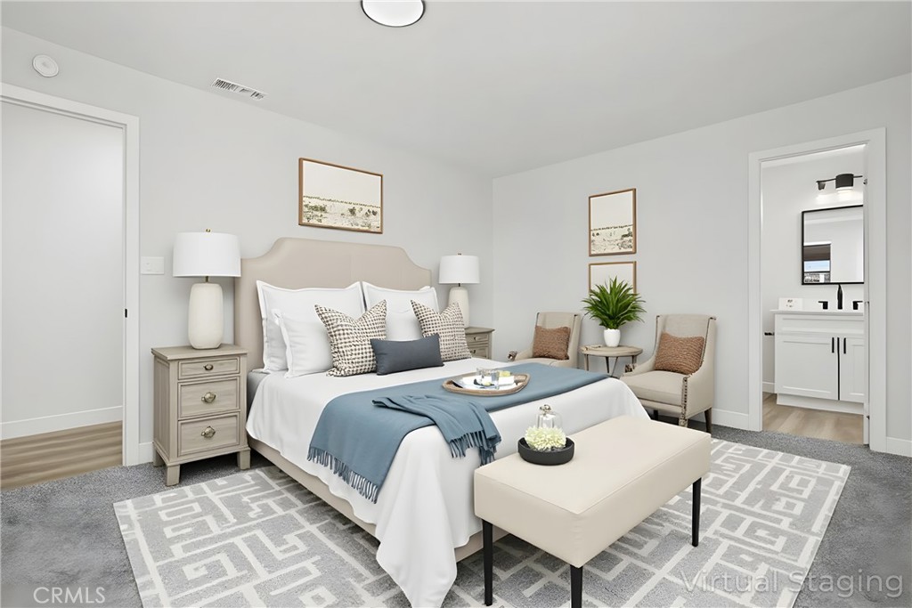 1116 7th Street Calimesa, CA 92320 - Photo 26 of 52 a bedroom with a bed a mirror and lamp