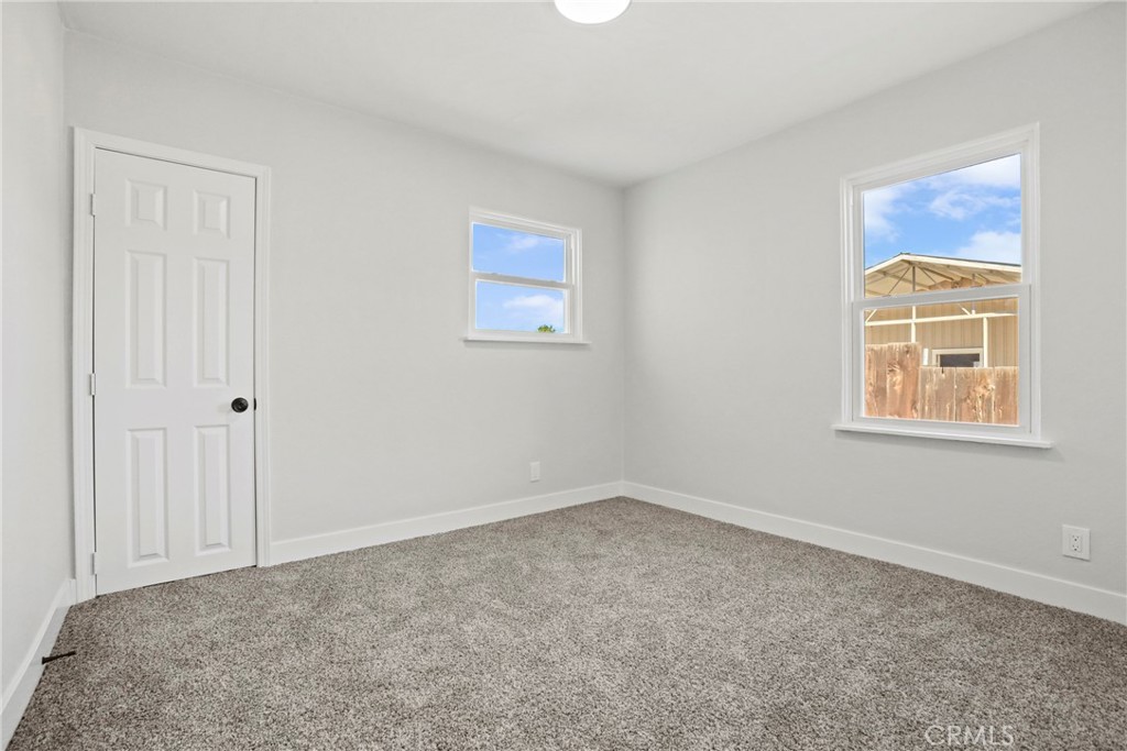 1116 7th Street Calimesa, CA 92320 - Photo 28 of 52 a view of an empty room with a window