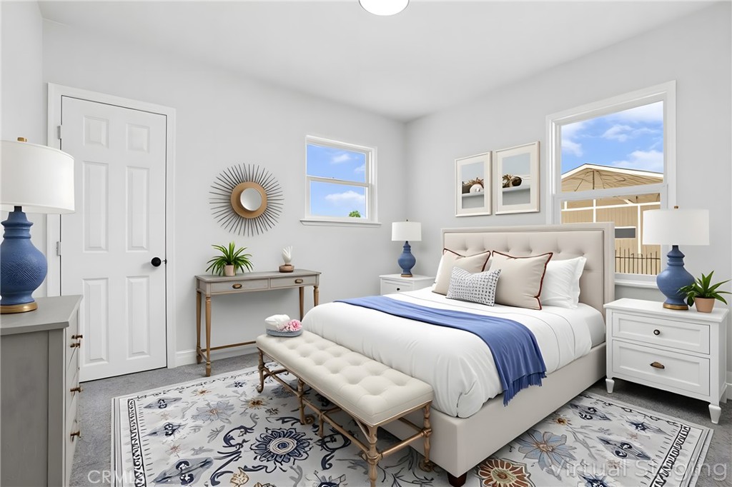 1116 7th Street Calimesa, CA 92320 - Photo 29 of 52 a bedroom with a bed and a window