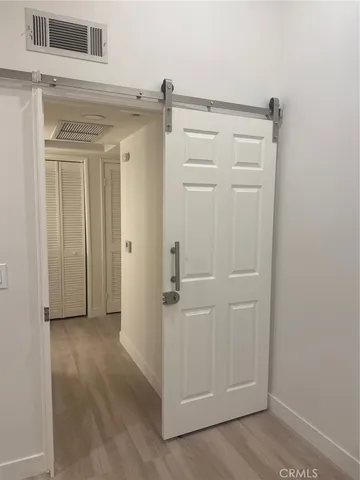 a bathroom with a granite countertop toilet sink and shower