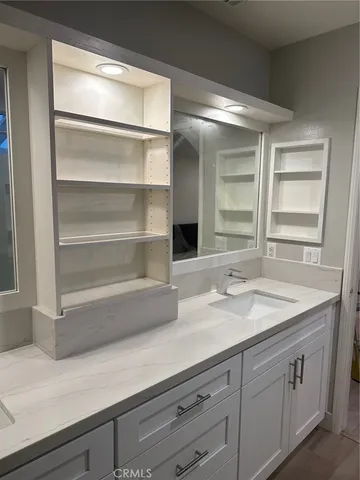 a view of a room with a bed