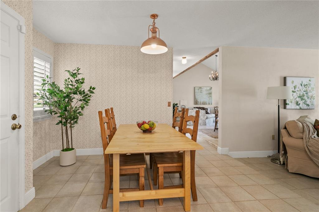 100 Bittern Court Daytona Beach, FL 32119 - Photo 15 of 52 a dining room with furniture and window