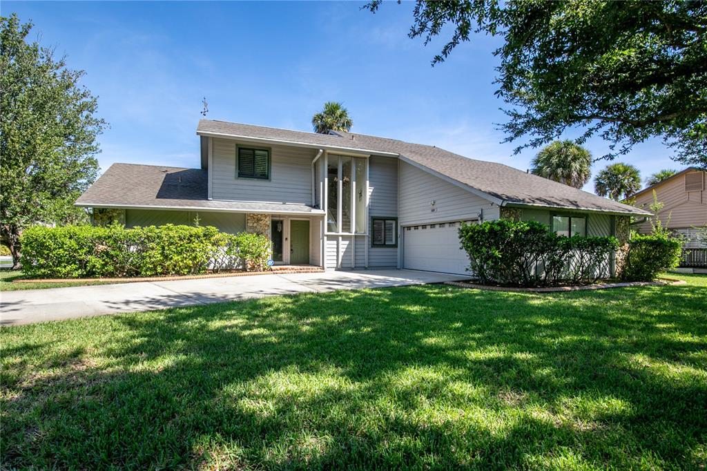 100 Bittern Court Daytona Beach, FL 32119 - Photo 35 of 52 a front view of house with a garden