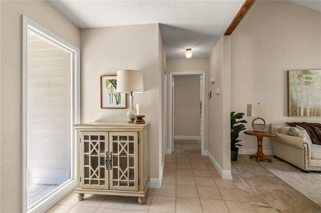 100 Bittern Court Daytona Beach, FL 32119 - Photo 4 of 52 a view of a livingroom with furniture and front door