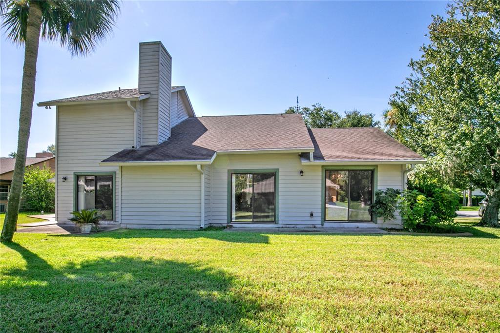 100 Bittern Court Daytona Beach, FL 32119 - Photo 42 of 52 a front view of a house with a yard