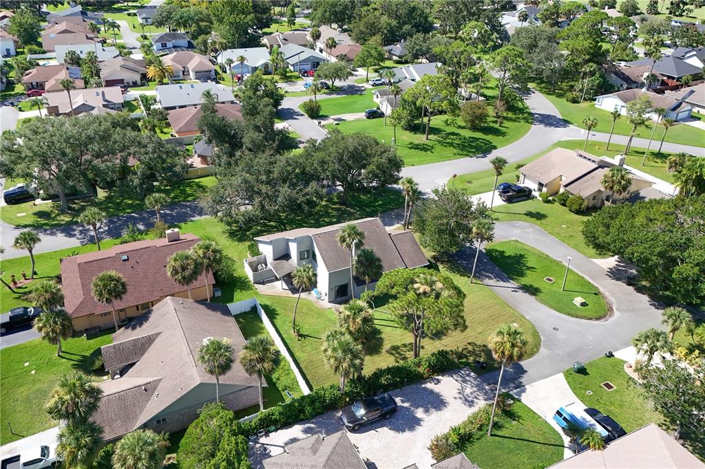 100 Bittern Court Daytona Beach, FL 32119 - Photo 46 of 52 an aerial view of a house with a yard