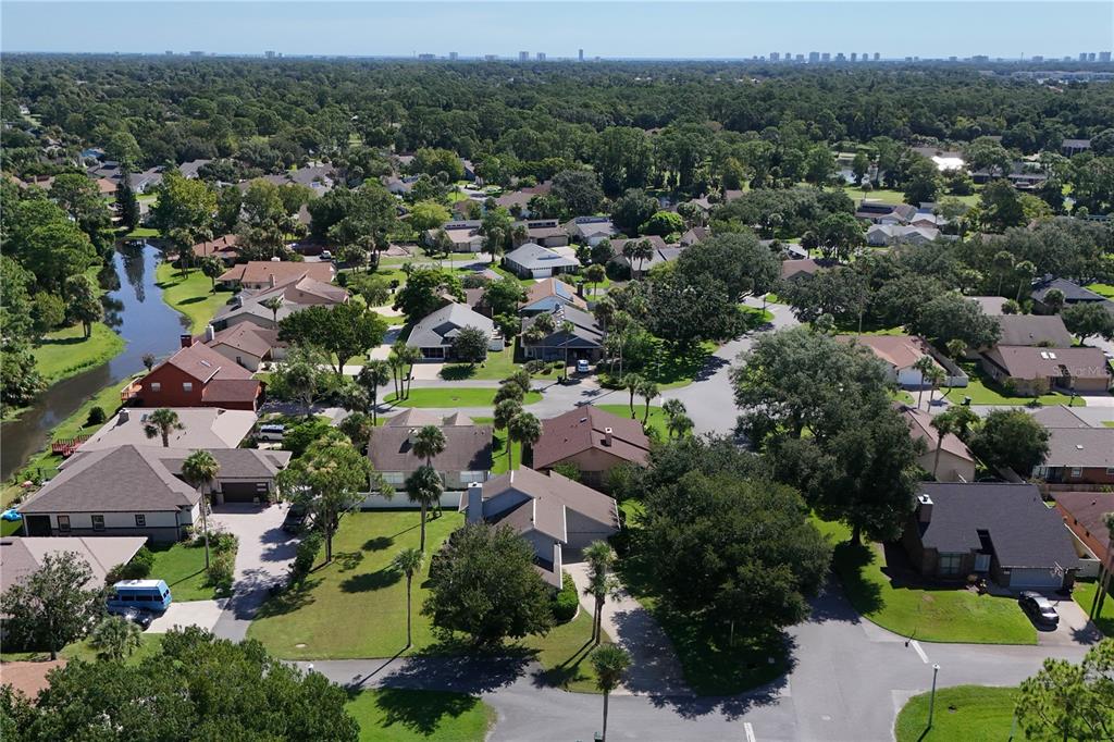 100 Bittern Court Daytona Beach, FL 32119 - Photo 48 of 52 an aerial view of residential houses with outdoor space