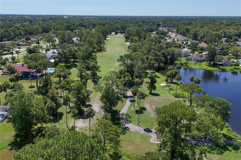 100 Bittern Court Daytona Beach, FL 32119 - Photo 49 of 52 a view of a lake with a city