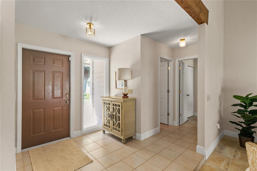 100 Bittern Court Daytona Beach, FL 32119 - Photo 5 of 52 a view of a hallway with closet and livingroom view