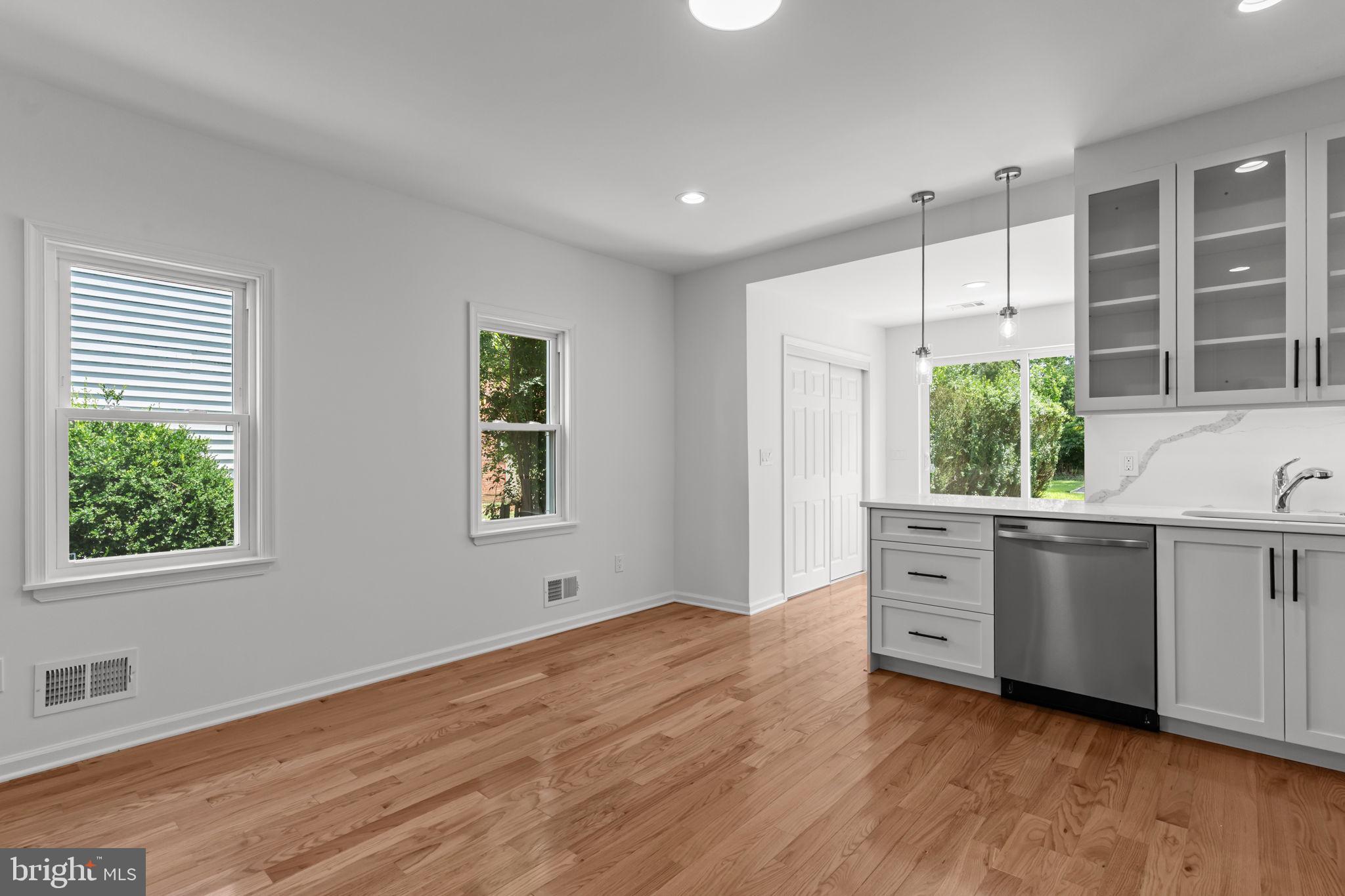 446 Pond Street Bristol, PA 19007 - Photo 14 of 35 a room with window wooden floors and walls