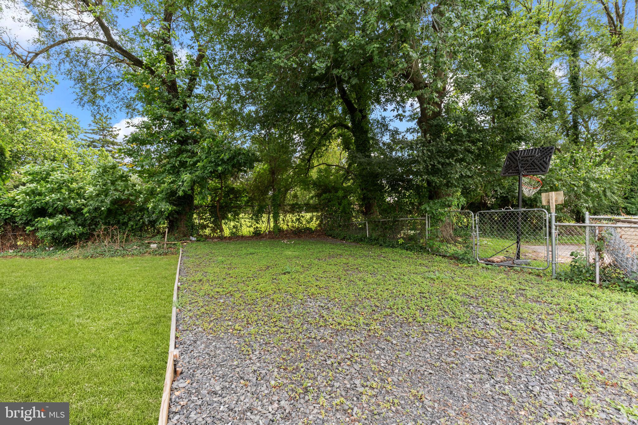 446 Pond Street Bristol, PA 19007 - Photo 33 of 35 a backyard of a house with lots of green space