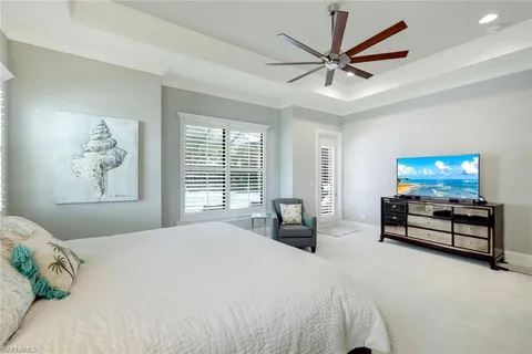 a bedroom with furniture and a bed