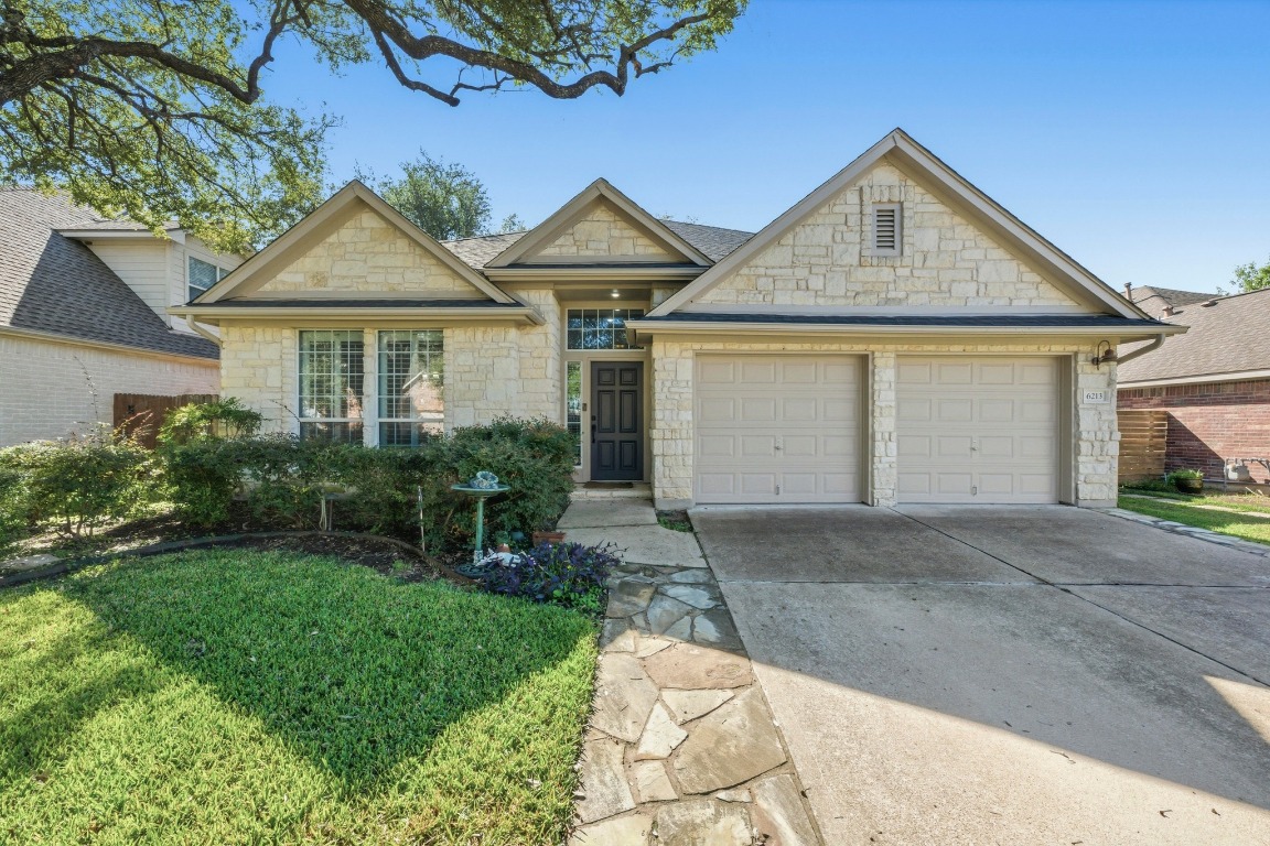 front view of a house and a yard