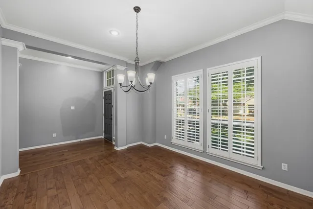 a view of a room with a chandelier