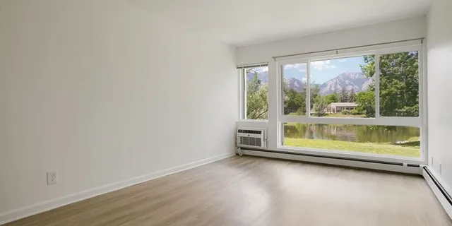 a view of room with window and pool