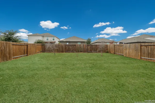 a view of a backyard with a garden