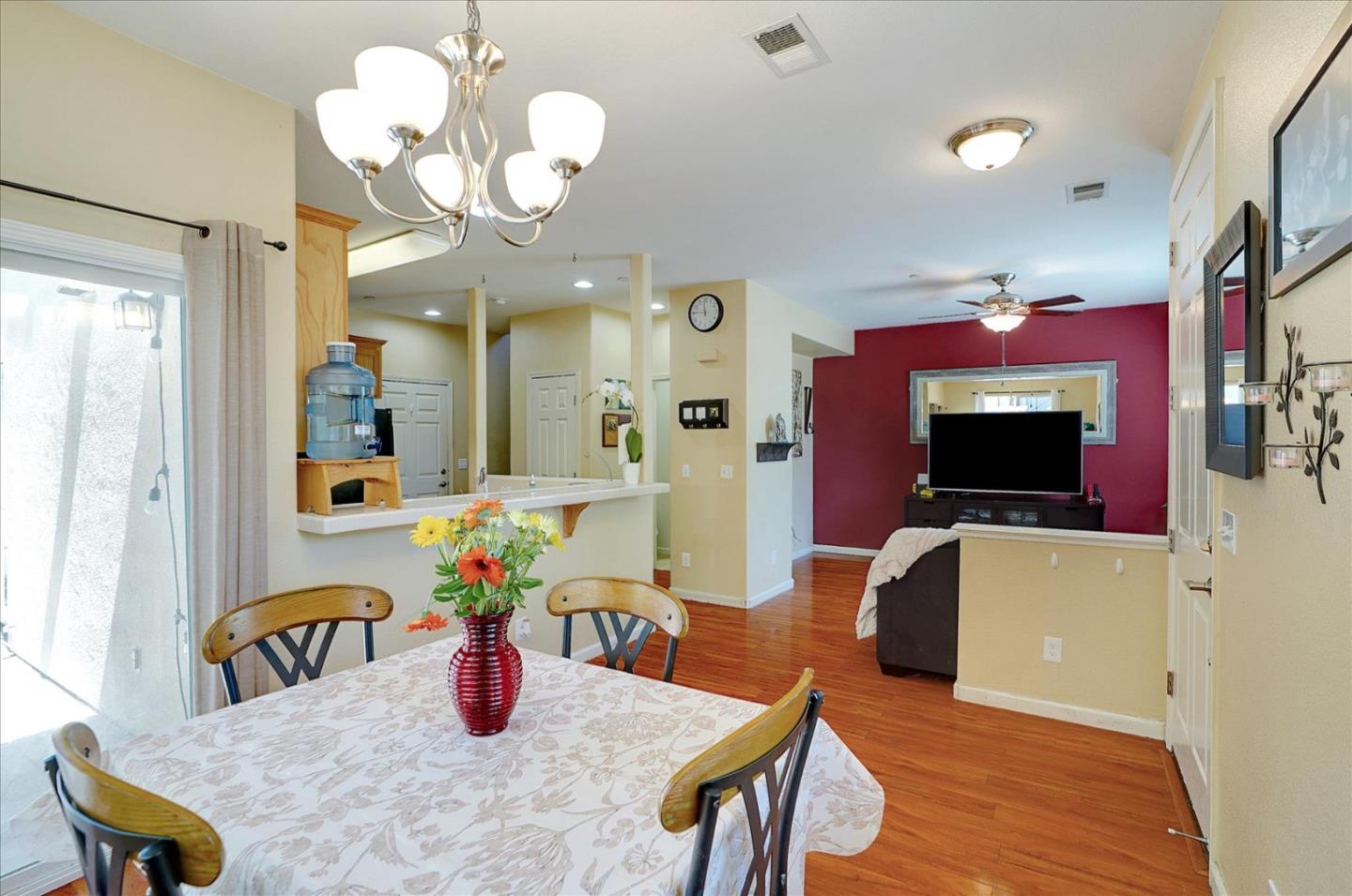15525 Watsonville Road Morgan Hill, CA 95037 - Photo 18 of 36 a dining room with furniture and wooden floor