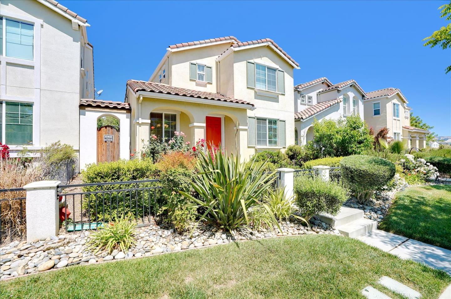 15525 Watsonville Road Morgan Hill, CA 95037 - Photo 2 of 36 a front view of a house with a yard