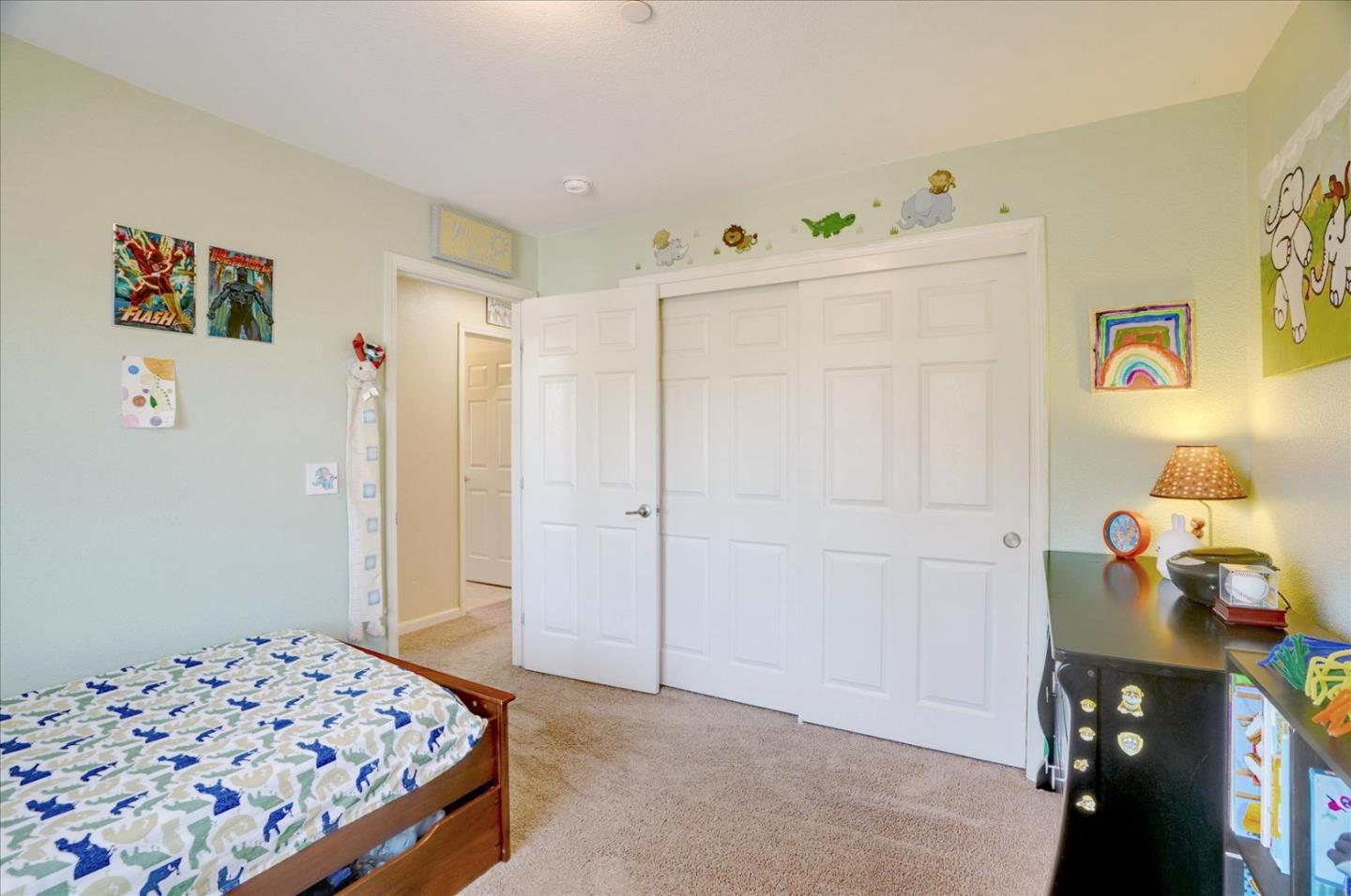 15525 Watsonville Road Morgan Hill, CA 95037 - Photo 21 of 36 a bedroom with a bed and cabinets