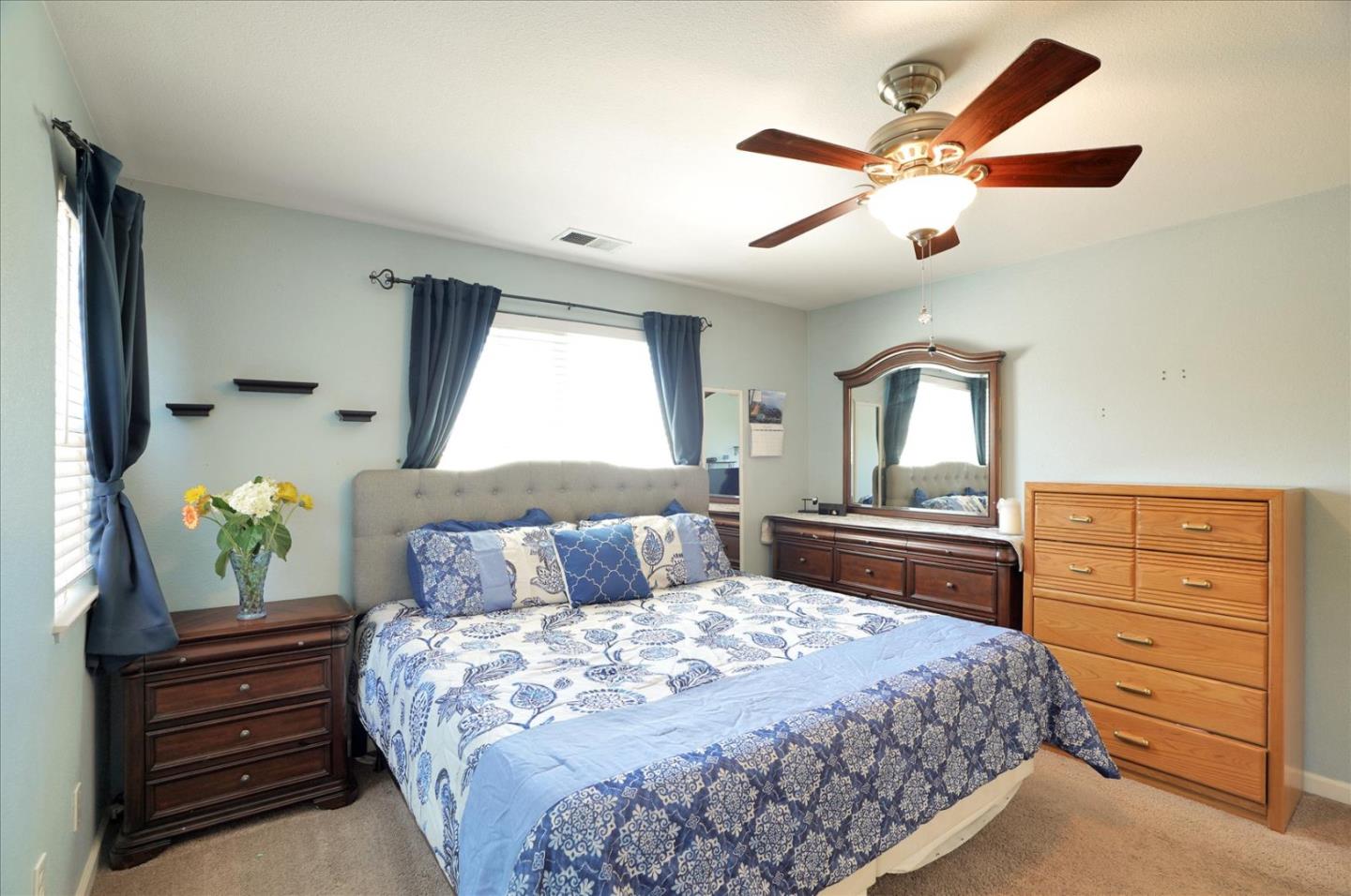 15525 Watsonville Road Morgan Hill, CA 95037 - Photo 24 of 36 a bedroom with a bed and a dresser