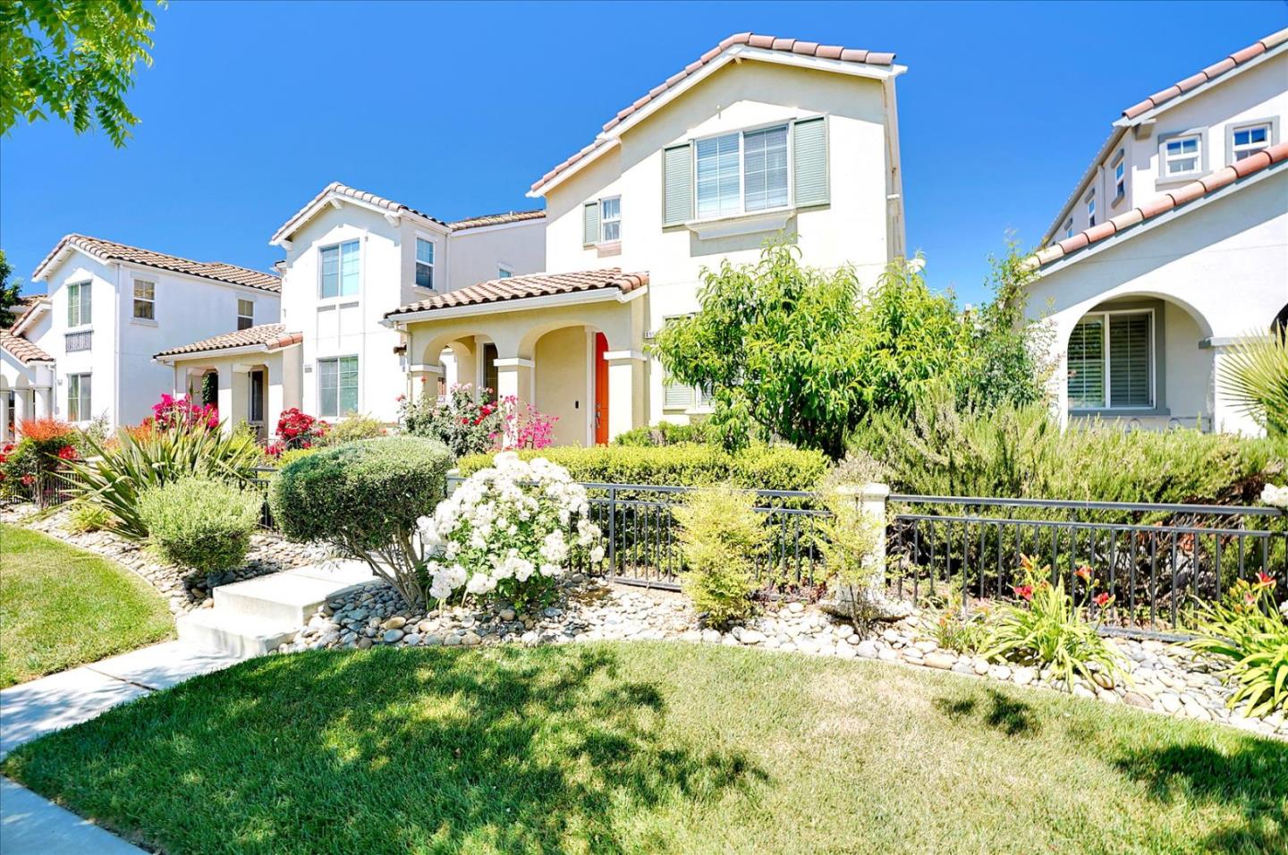 15525 Watsonville Road Morgan Hill, CA 95037 - Photo 3 of 36 a front view of a house with a yard