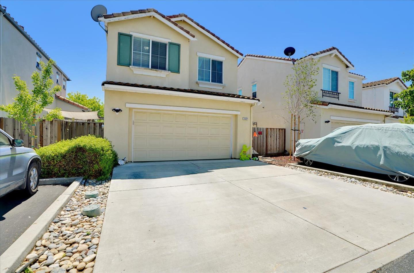 15525 Watsonville Road Morgan Hill, CA 95037 - Photo 5 of 36 a front view of a house with a yard