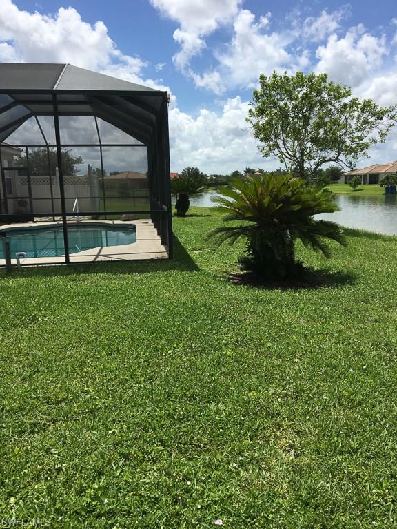 2161 Rusty Fig Court Naples, FL 34120 - Photo 16 of 17 a view of a garden