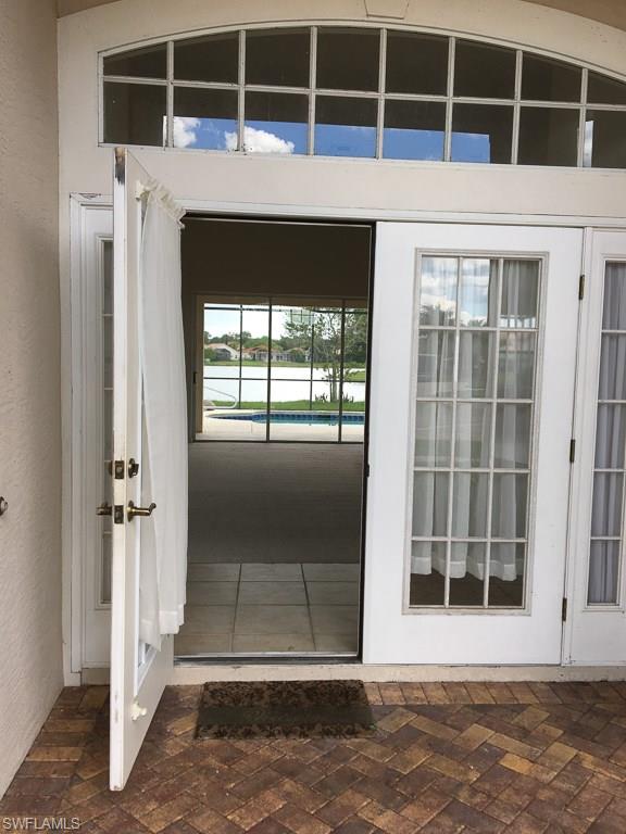 2161 Rusty Fig Court Naples, FL 34120 - Photo 3 of 17 a view of front door