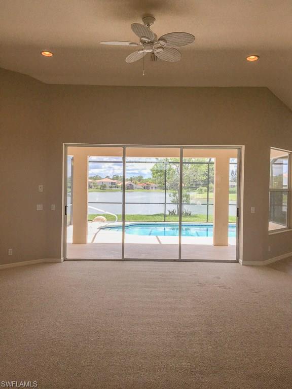 2161 Rusty Fig Court Naples, FL 34120 - Photo 5 of 17 a view of an empty room with a large window