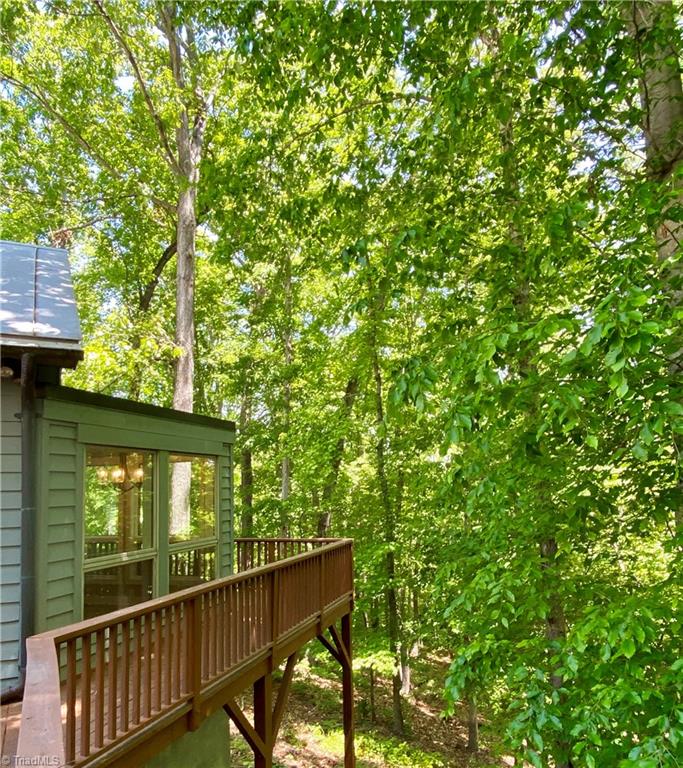 800 Scott Road Lewisville, NC 27023 - Photo 5 of 30 Decking all around back side of home.