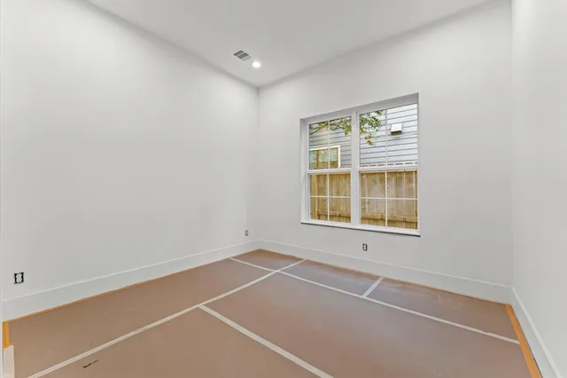 a view of a room with windows