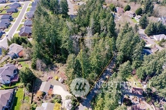 2218 Lybecker Road Northwest Gig Harbor, WA 98332 - Photo 10 of 10 an aerial view of residential house with outdoor space and trees all around
